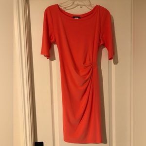 Stretchy, form-fitting, coral dress. Size medium.